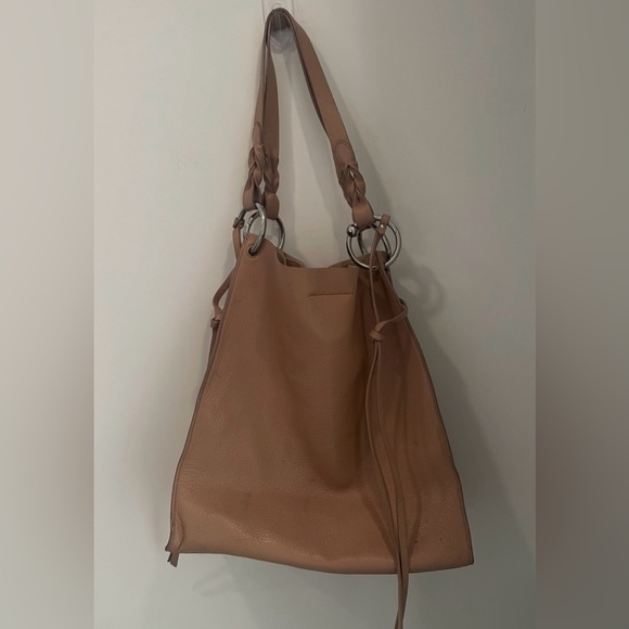 Rebecca Minkoff 
•North South Tote 
•Leather
•Magnetic closure
•Silver hardware - Picture 3 of 8